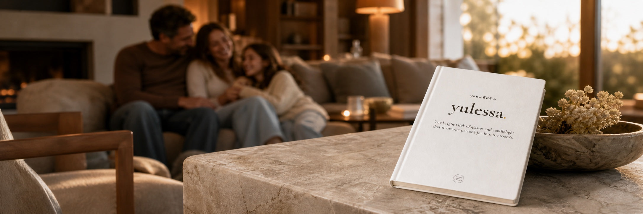 Word-of-the-day journal for the word yulessa on a stone table, with a family together on the sofa behind it