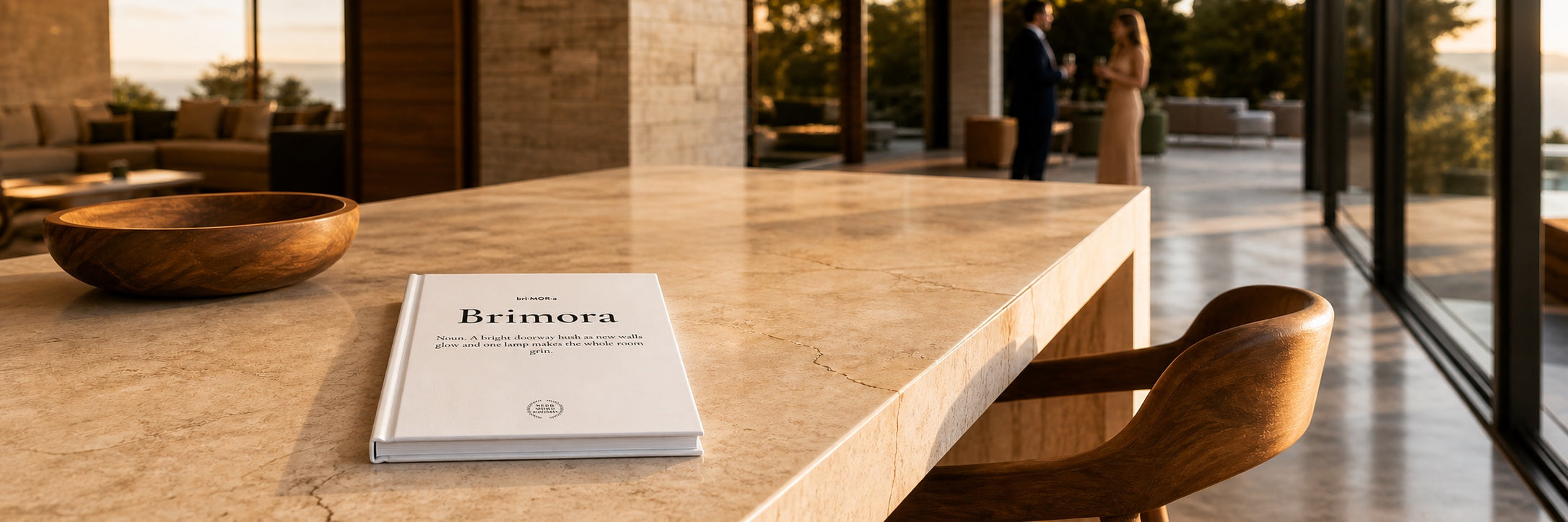Word-of-the-day journal for the word Brimora on a marble counter in a sunlit modern home